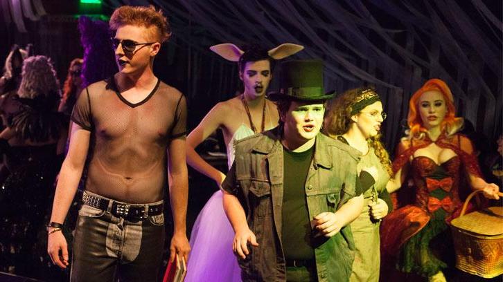 Actors in risque clubwear and animal costumes sing in a production of Into the Woods.